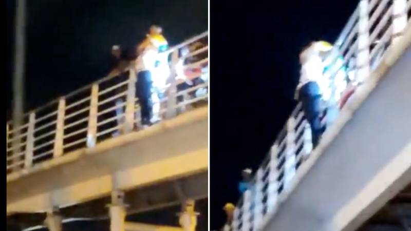 Varios ciudadanos grabaron a una mujer intentando lanzarse al vacío desde el puente MIO, en Cali.
