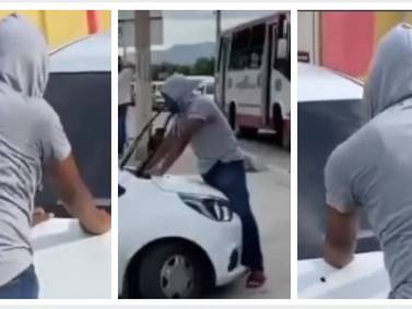 [En video]: Drama en un motel, hombre detiene un carro: “Atropéllame si quieres”