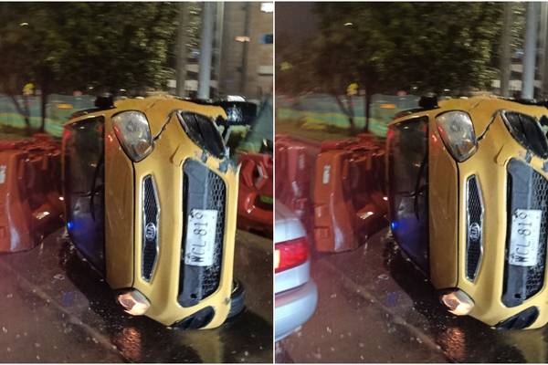 Taxista ebrio provocó accidente en la Av. Calle 26 de Bogotá: volcó el vehículo 
