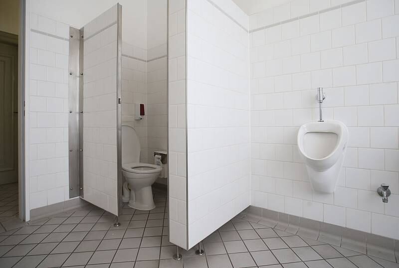 A toilet and a urinal stand in a newly-inaugurated gender-free toilet at the office building of the city's Senate Administration for Work, Integration and Women (Senatsverwaltung fuer Arbeit, Integration und Frauen) on November 24, 2015 in Berlin, Germany. The administration has converted four of its previously separate men's and women's toilets to gender-free toilets in a sign of respect towards Berlin's trans-gender community, who otherwise often face potentially uncomfortable decisions or confrontations in the use of public toilets.