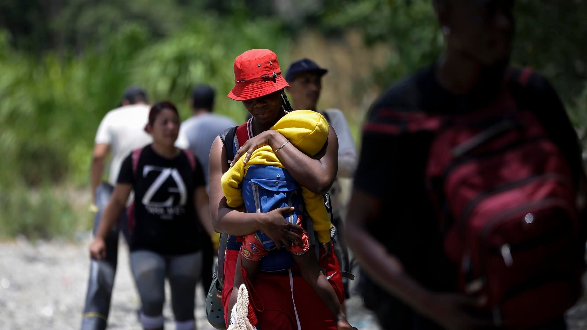 Migrantes cruzando la Selva del Darién