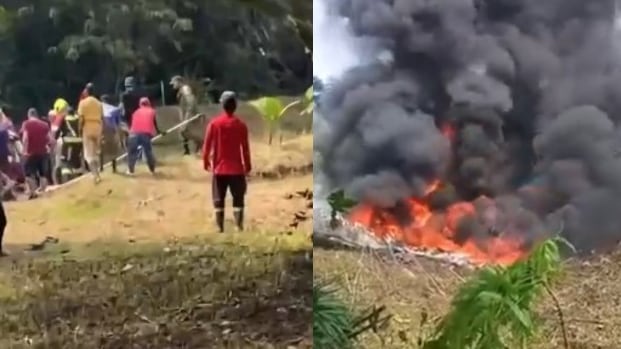 Foto vecinos intentan apagar incendio tras accidente de avión Hércules en Putumayo: dramáticas escenas en Puerto Leguízamo.