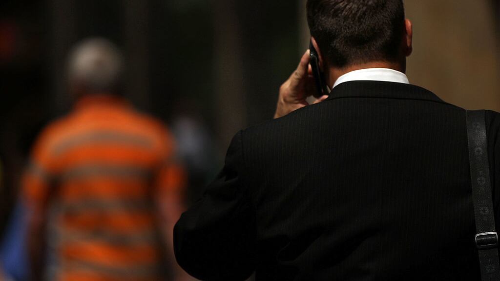NEW YORK, NY - MAY 31: A man speaks on his mobile phone on May 31, 2011 in New York City. In a new report by 31 scientists meeting at the World Health Organization's International Agency for Research on Cancer (WHO/IARC) it was found that using a mobile phone may increase your risk for certain kinds of brain cancers. While further scientific work will be conducted, the group of scientists from 14 countries classified cellphones in the carcinogenic category 2B, which is similar to the pesticide DDT and gasoline engine exhaust.