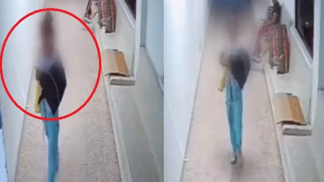 Foto del video en el cual una mujer intenta raptar a un bebé de un hospital.