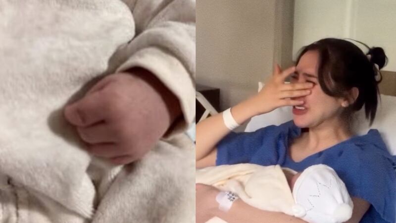 Aida Victoria Merlano junto a su bebé