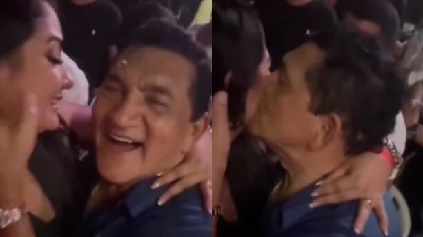 Poncho Zuleta junto a seguidora en concierto.