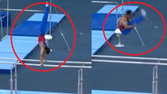 Foto de la rutina de Ángel Barajas que gana medalla de oro en barras paralelas en la Copa del Mundo de Gimnasia en Bakú.