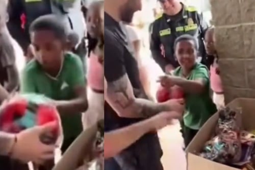 Niño hincha del Cali fue a un evento de regalos para Navidad de la barra del América y le tocó conformarse con un balón rojo