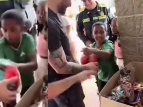 Niño hincha del Cali fue a un evento de regalos para Navidad de la barra del América y le tocó conformarse con un balón rojo