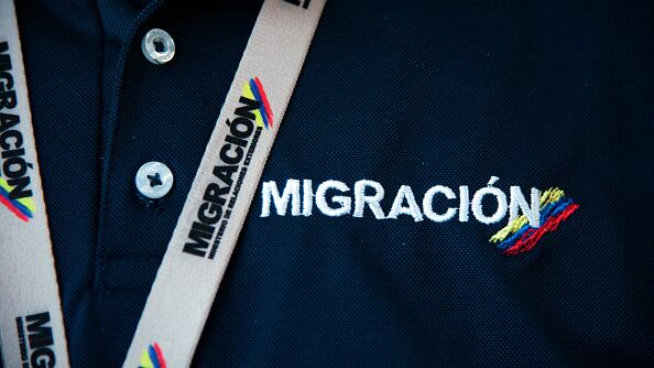 Colombia's migration officers during the launch of 'BIOMIG' a new biometric migration system aimed for foreigners in El Dorado International Airport, in Bogota, Colombia, June 2, 2023.