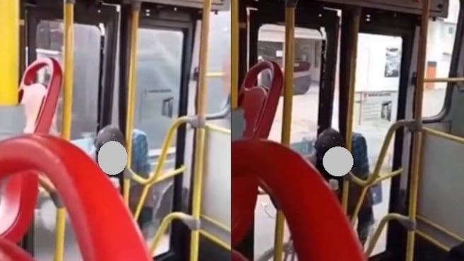Foto usuario quedó colgado por el cuello en bus mientras pasajeros pedían ayuda.