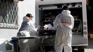 Foto referencial de un levantamiento de cadáver pot parte del CTI.