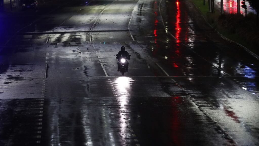 BUENOS AIRES, ARGENTINA - MAY 22: A man rides his motorcycle on Figueroa Alcorta avenue during the first day of the government-imposed lockdown on May 22, 2021 in Buenos Aires, Argentina. President Fernandez announced a national lockdown until May 31 as Argentina undergoes a critical moment due to increase of deaths and cases of COVID. So far, 4.7% of the population has been inoculated and 18.4% has received at least one dose.