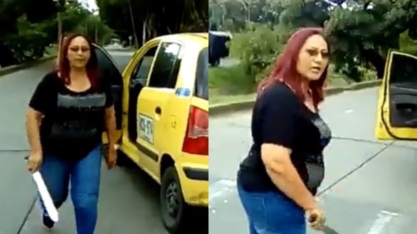 Mujer taxista agrede a un motociclista con un machete.