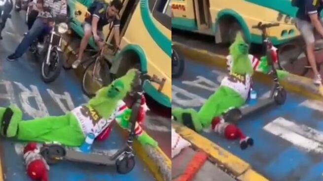 Grinch navideño con un parlante defiende cicloruta en Bucaramanga.